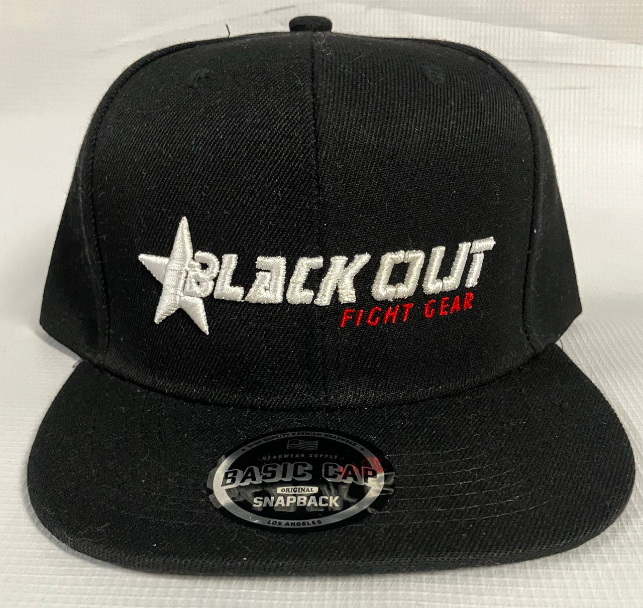 Blackout fight gear snapback hat.